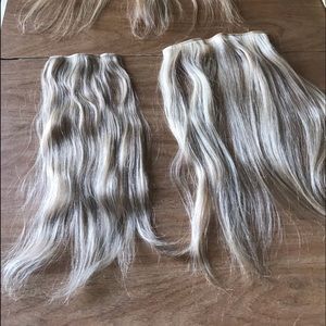 Clip in human blonde hair extensions